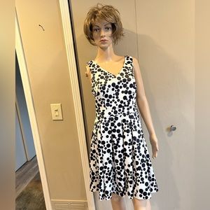 NWT  Black polka dot dress off the shoulder. Casual-Dressy. Beautiful sheen.